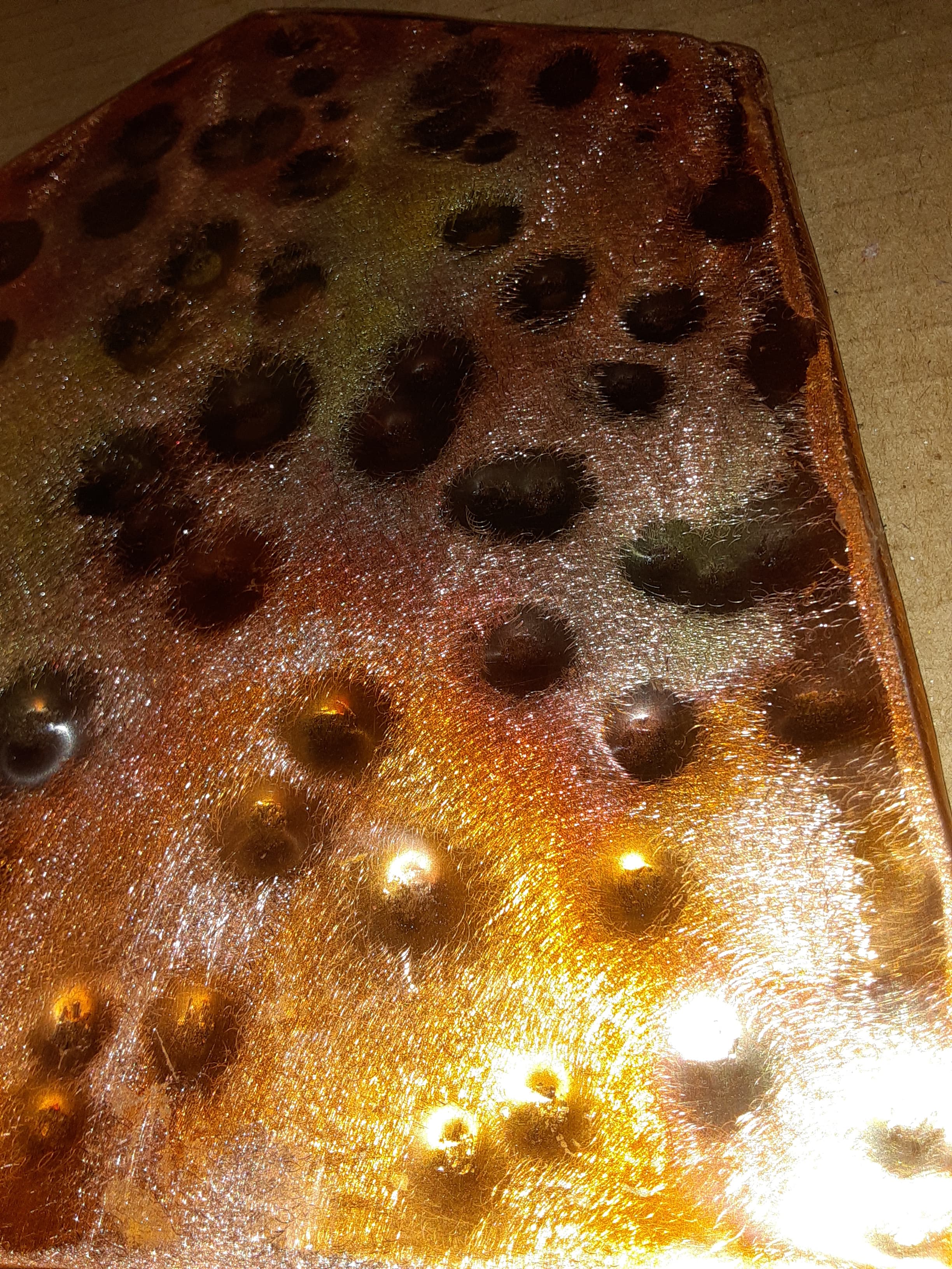 Hand-hammered copper with backlit punched pattern